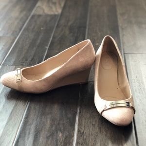 Calvin Klein snake skin wedges.